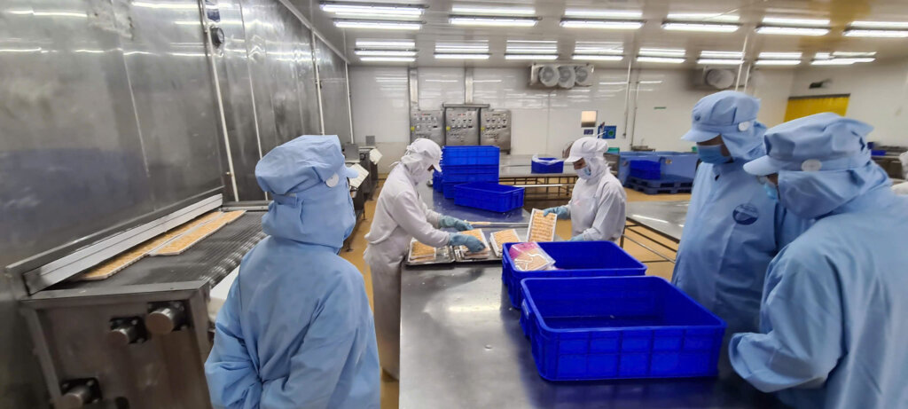 Quality control inspection in a reliable seafood supplier in Vietnam seafood factory