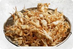 Vietnam Frozen Breaded Baby Crab beautifully presented for display