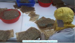 Workers producing Dried Seasoned Leather Jacket Fish in Vietnam