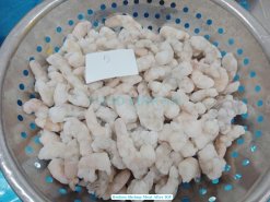 Frozen Broken Vannamei Shrimp Meat after IQF freezing in Vietnam
