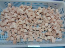 Frozen Alaska Pollock dice after IQF freezing produced in Vietnam