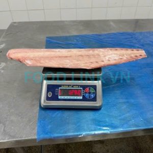 Weight inspection of fish fillets after IQF in Vietnam