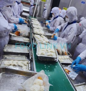 Quality control inspection during breaded shrimp production